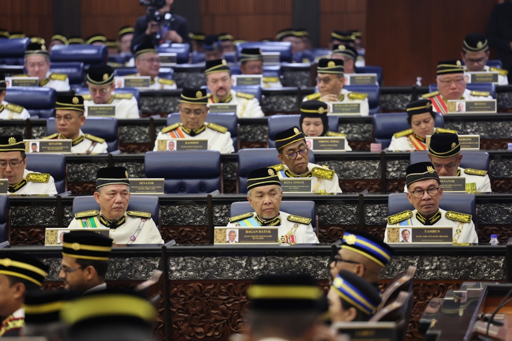 Prime Minister Datuk Seri Anwar Ibrahim with Deputy Prime Ministers Datuk Seri Ahmad Zahid Hamidi and Datuk Seri Fadillah Yusof at the official opening of the First Meeting of the Third Session of the 15th Parliament in Dewan Rakyat, February 26, 2024. — Bernama pic 