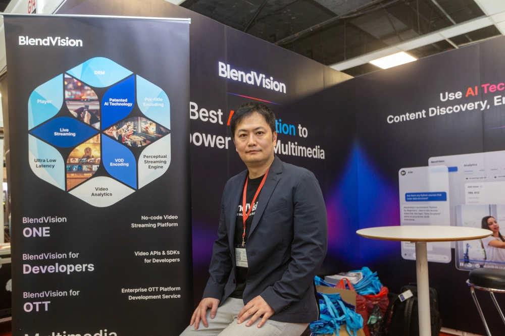 Lee at the Blend Vision booth. — Picture by Raymond Manuel  