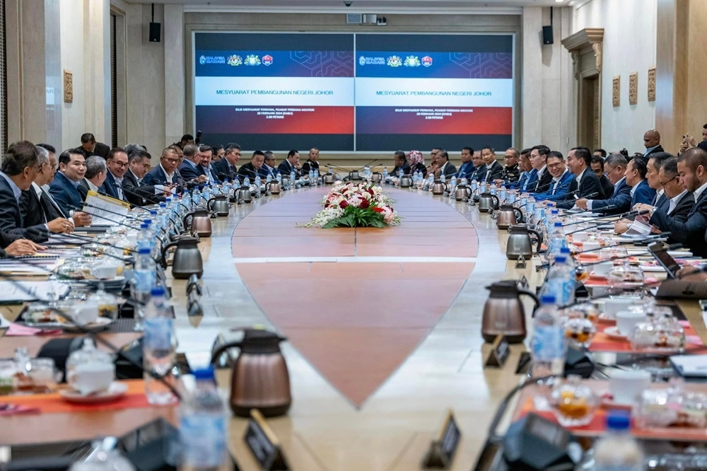 Prime Minister Datuk Seri Anwar Ibrahim (seated, 6th right) attends the Johor State Development Meeting in Putrajaya February 28, 2024. — Picture via Facebook/Anwar Ibrahim