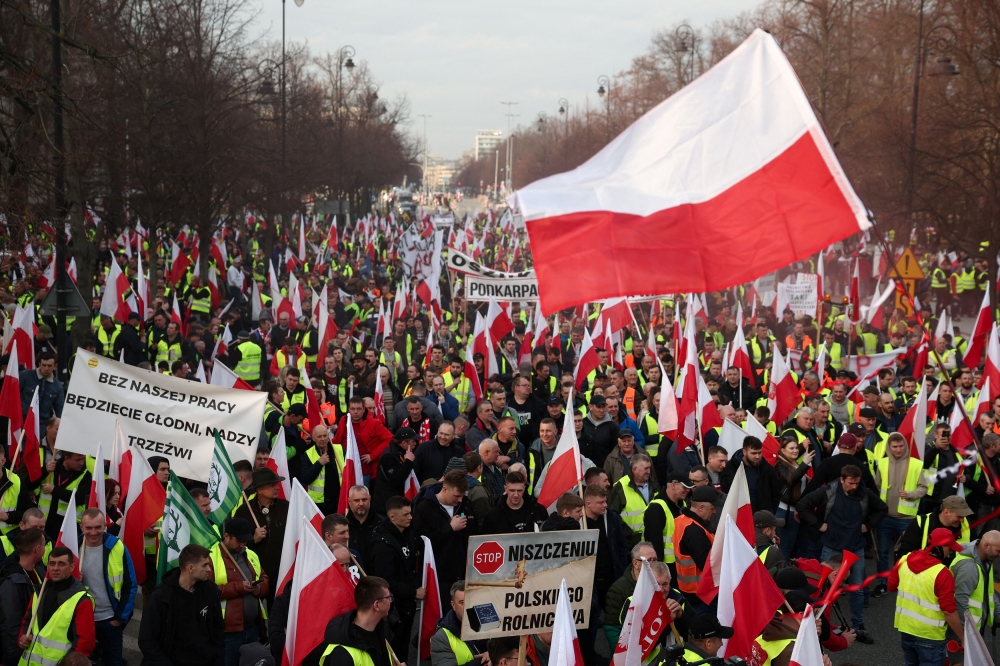 Polish farmers protest over price pressures, taxes and green regulation, grievances shared by farmers across Europe and against the import of agricultural produce and food products from Ukraine, outside the Chancellery of the Prime Minister in Warsaw, Poland, February 27, 2024. — Reuters pic