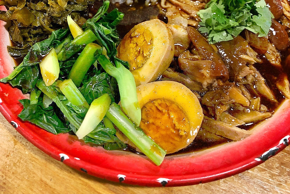 Thai Chala’s 'kao kha moo' gravy is sweeter with deeper, stronger flavours.