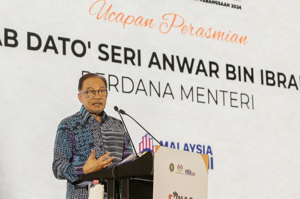 Prime Minister Datuk Seri Anwar Ibrahim speaks at the National Anti-Corruption Summit (NACS) 2024 in Kuala Lumpur February 29, 2024. ― Picture by Sayuti Zainudin