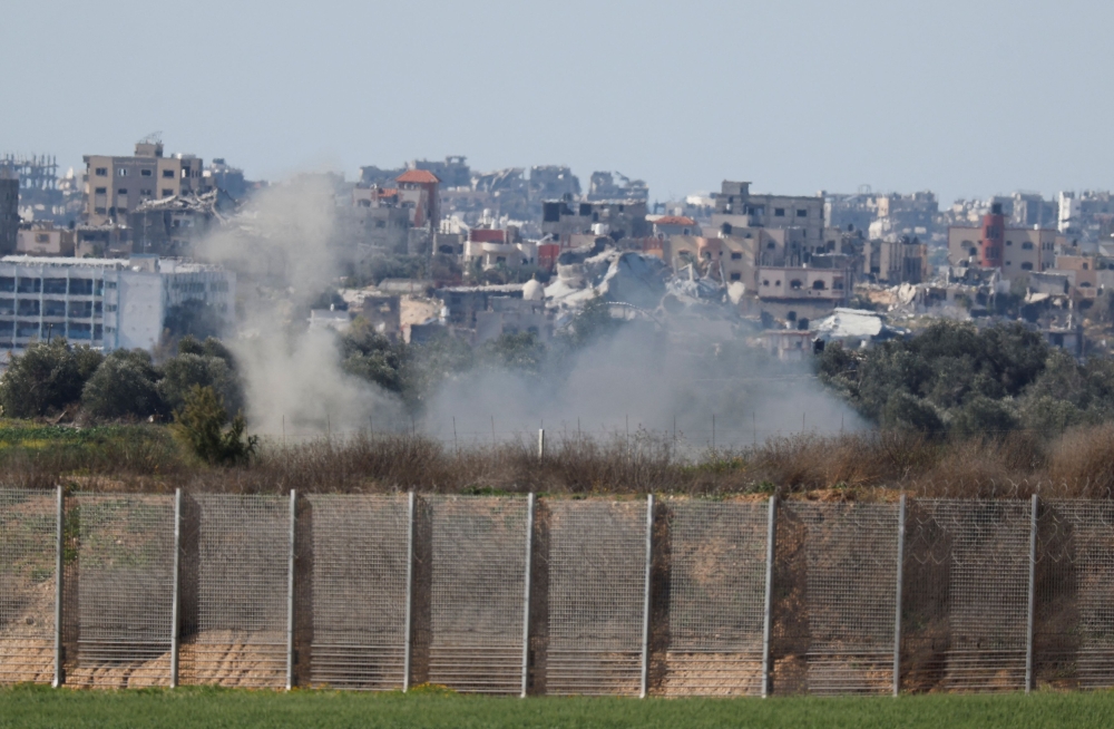 Smoke rises in the northern Gaza strip, as seen from southern Israel,  February 29, 2024. — Reuters pic