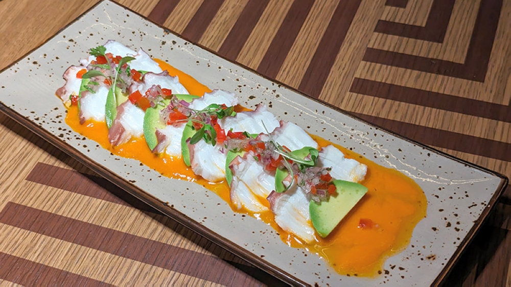 Tiradito de Pulpo y Palta is a refreshing start to the meal.