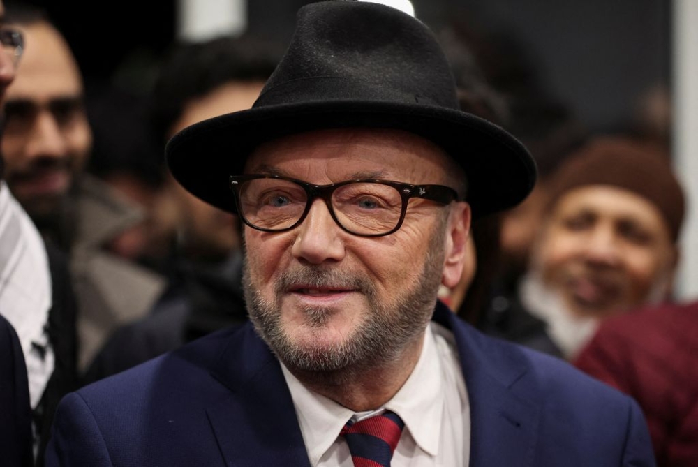 George Galloway, leader of the Workers Party of Britain, looks on as he participates in a rally after winning the Rochdale Parliamentary by-election, at his campaign headquarters, in Rochdale, near Manchester, Britain, March 1, 2024. — Reuters pic