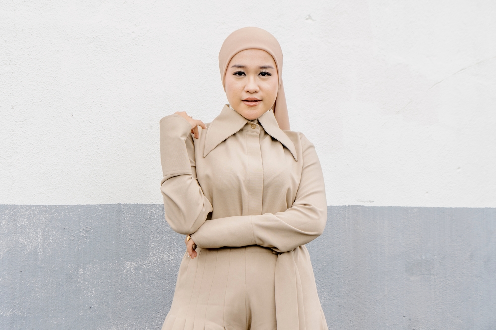 Singer Ernie Zakri wants to give back to her fans with her performance of 'Astana' at AJL38. — Picture by Shafwan Zaidon