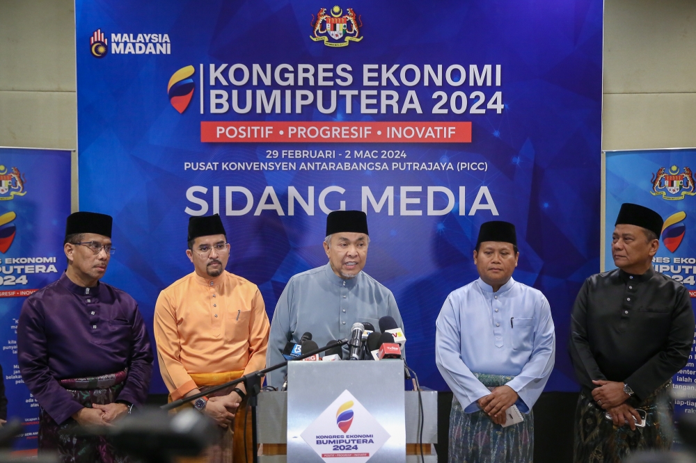 Deputy Prime Minister Datuk Ser Ahmad Zahid Hamidi (centre) speaks during a press conference at the 2024 Bumiputera Economic Congress at PICC in Putrajaya March 2, 2024. — Picture by Yusof Mat Isa
