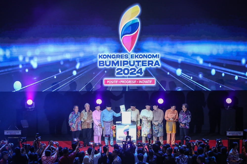 Prime Minister Datuk Seri Anwar Ibrahim (centre) is seen at the closing ceremony of the 2024 Bumiputera Economic Congress at PICC in Putrajaya March 2, 2024. — Picture by Yusof Mat Isa