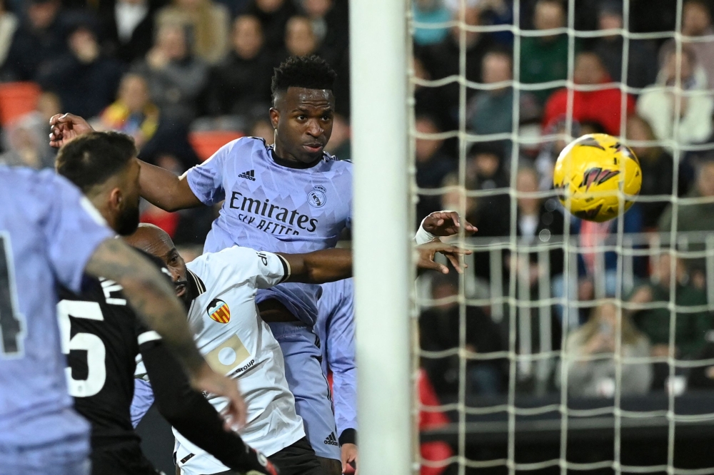 Valencia’s Diakhaby suffers severe leg injury in Real Madrid draw ...