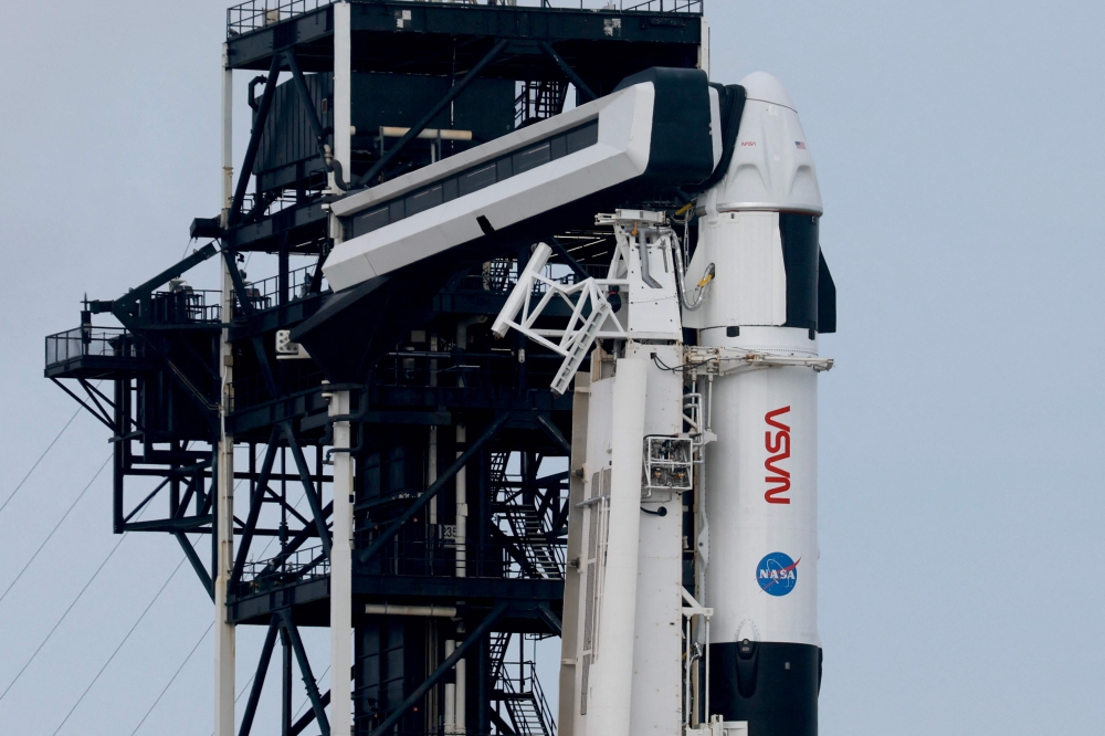 Three American astronauts and a Russian cosmonaut were set to launch for the International Space Station yesterday, the latest crew rotation for the orbital outpost. — AFP pic