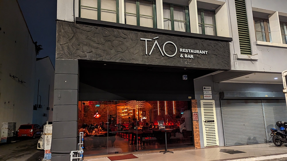 Look for the dark storefront to get to Táo.