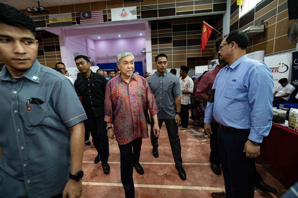 Deputy Prime Minister Datuk Seri Ahmad Zahid Hamidi visits the Mini Showcase organised by the Northern Corridor Economic Region at Dewan Dato Lope Hashim, Bagan Datuk March 3, 2024. — Bernama pic