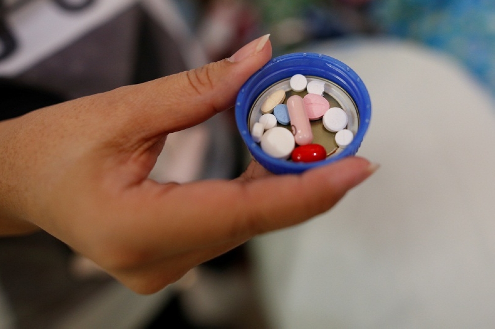Malaysian Pharmacists Society president Professor Amrahi Buang said that it is the responsibility of pharmacists to carry out necessary checks before providing medicine categorised under Group B. — Reuters pic