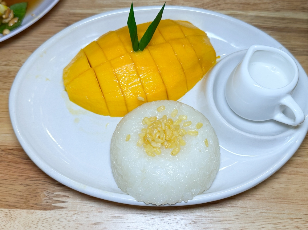 Mango Sticky Rice is the best way to end a meal and this version boasts sweet, just ripe mango with sticky rice and a touch of coconut milk.