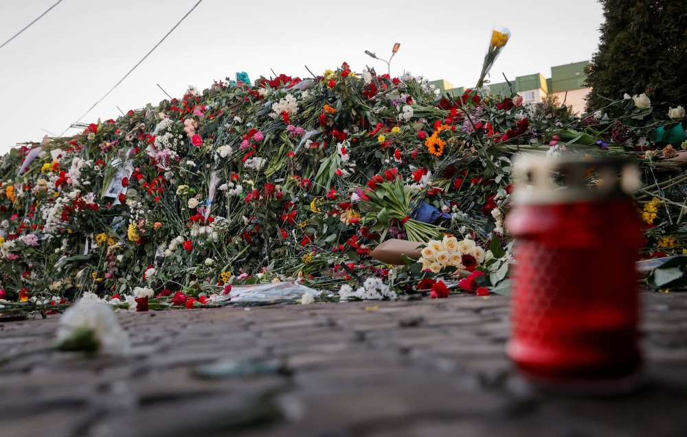Flowers are placed on the grave of Russian opposition politician Alexei Navalny at the Borisovskoye cemetery, in Moscow, Russia, March 3, 2024. — Reuters pic