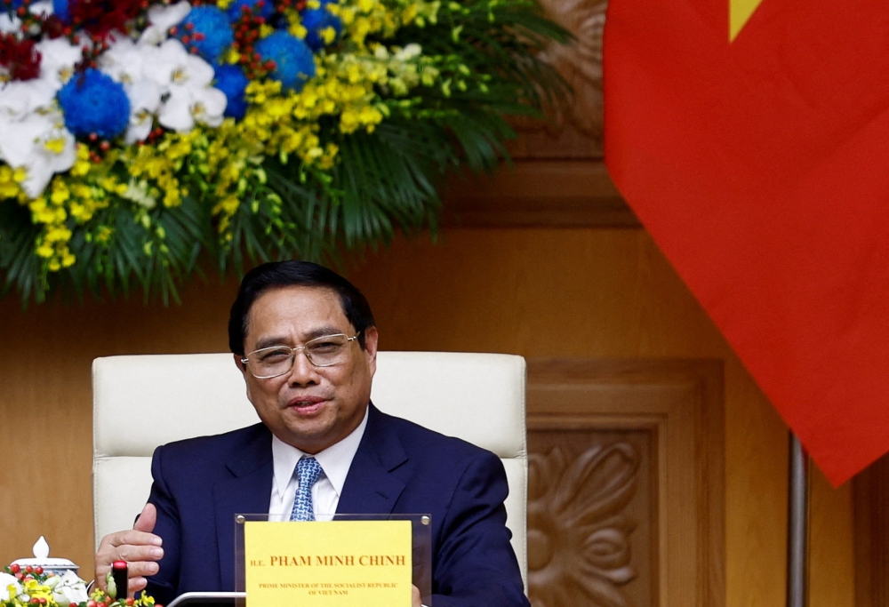Vietnamese Prime Minister Pham Minh Chinh says an upgrade of bilateral ties would ‘bring the two countries' relationship into greater depth, substance and effectiveness’. — Reuters pic