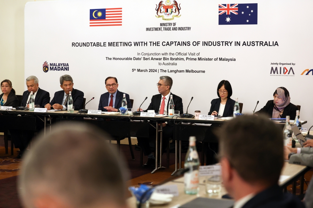 Prime Minister Datuk Seri Anwar Ibrahim delivered his keynote adress during a Round Table Meeting with the captain of industry in Australia, in Melbourne March 5, 2024. Also present Minister of Investment, Trade and Industry Datuk Seri Tengku Zafrul Tengku Abdul Aziz and Foreign Minister Datuk Seri Mohamad Hasan. — Bernama pic