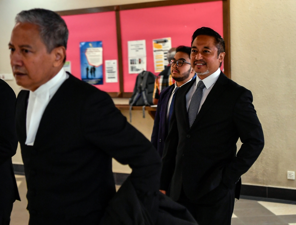 Former Umno Supreme Council (MT) member Isham Jalil (right) pictured at the Kuala Lumpur High Court, March 4, 2024. — Bernama pic