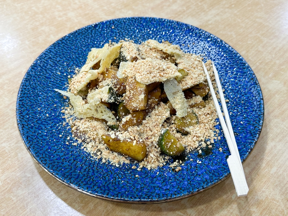 Fresh Fruit Rojak uses a milder sauce and lots of ground peanuts for its assorted mix of fruits and vegetables.
