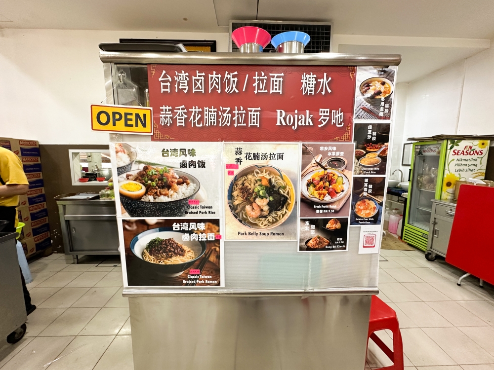 Find the stall right at the back of the coffee shop.