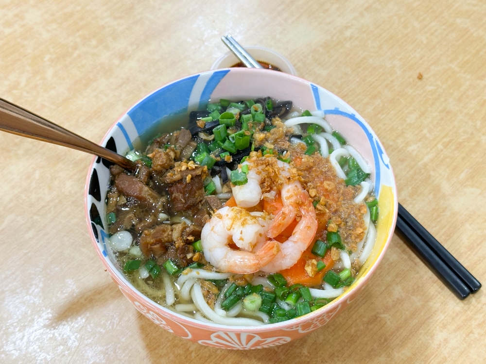 Pork Belly Soup Ramen is comforting with its pork and prawn combination with shredded wood ear fungus, carrots and a dollop of garlic puree. — Pictures by Lee Khang Yi