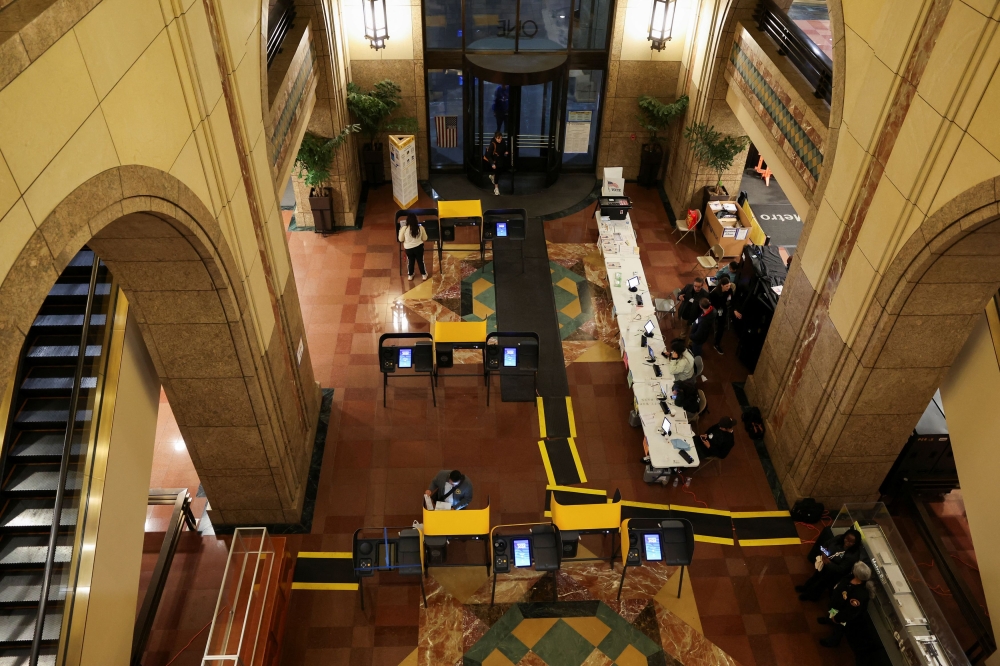 People vote during the Super Tuesday primary election at the Metro Headquarters polling center in Los Angeles, California March 5, 2024.— Reuters pic