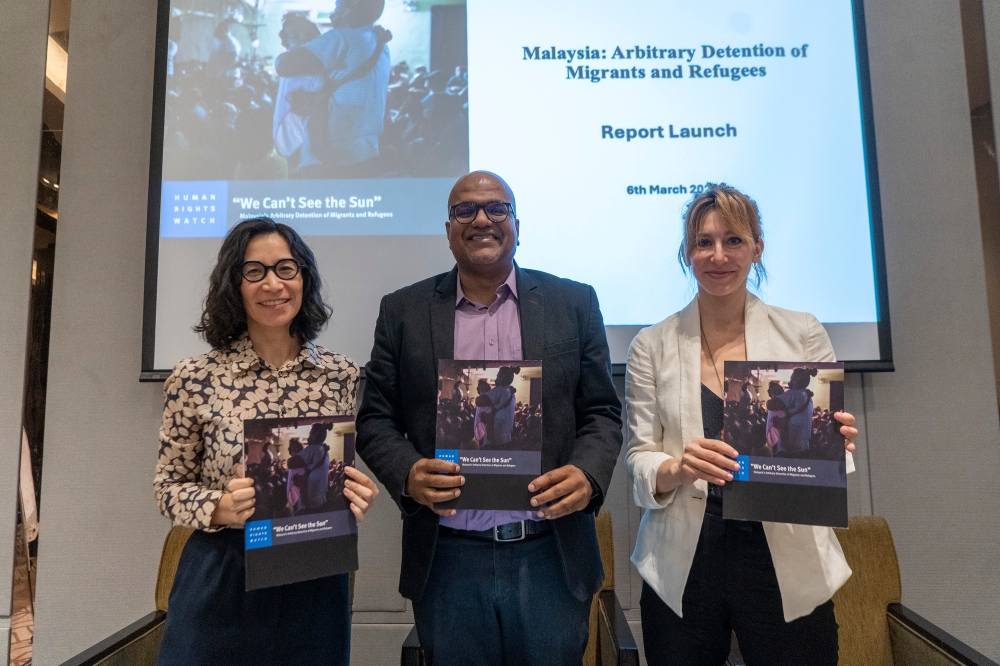 (From left) Human Rights Watch (HRW) deputy Asia director Bryony Lau, HRW researcher Jerald Joseph and HRW Asia division researcher Shayna Bauchner at the launch of the HRW report titled ‘We Can’t See the Sun: Malaysia’s Arbitrary Detention of Migrants and Refugees’, in Petaling Jaya March 6, 2024. — Picture by Shafwan Zaidon