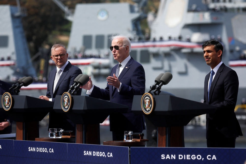 US President Joe Biden, Australian Prime Minister Anthony Albanese and British Prime Minister Rishi Sunak deliver remarks on the Australia - United Kingdom - US (Aukus) partnership, after a trilateral meeting, at Naval Base Point Loma in San Diego, California March 13, 2023. — Reuters file pic
