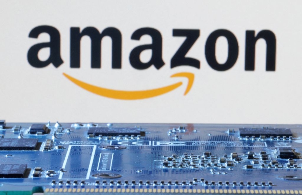 Amazon logo is seen near computer motherboard in this illustration taken January 8, 2024. — Reuters pic