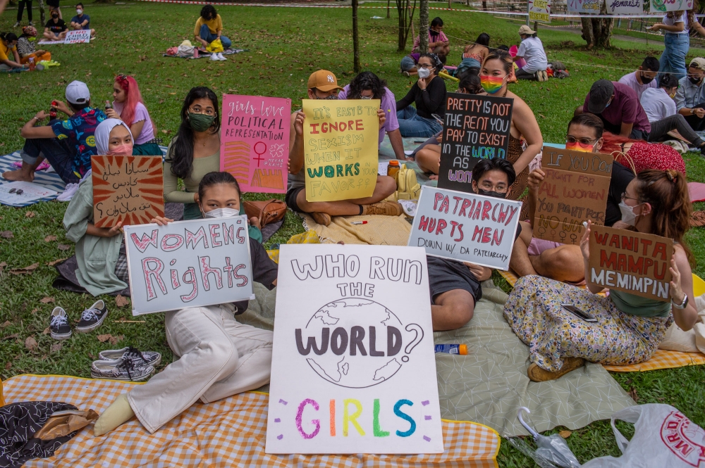 Participants take part in the Women’s March event in conjunction with International Women’s Day organised by WomenMarchMy at Taman Jaya Park in this file photo taken on March 6, 2022. A recent survey ahead of International Women’s Day tomorrow said that four out of 10 Malaysians prefer male leaders or bosses, which is significantly higher than the global average. — Picture by Shafwan Zaidon