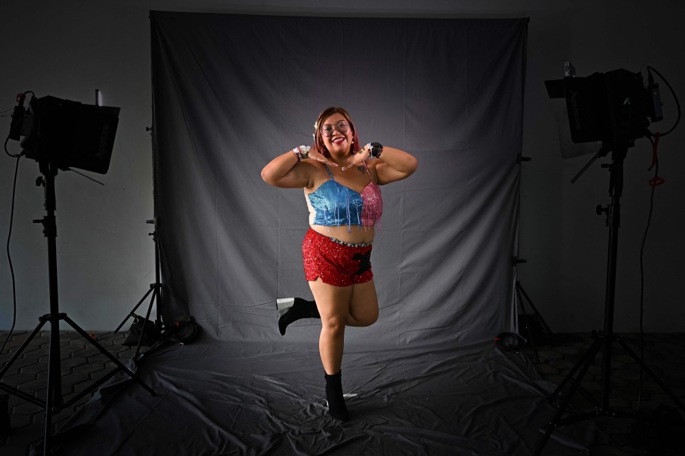Searle Lira from the Philippines, a fan of US singer Taylor Swift, also known as a Swiftie, poses for photos before the pop star's Eras Tour concert at the National Stadium in Singapore March 7, 2024. — AFP pic 
