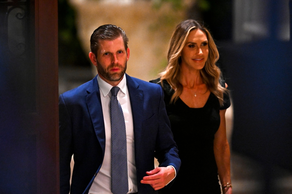 Eric Trump (left), son of former US President and 2024 presidential hopeful Donald Trump, and his wife Lara Trump attend a Super Tuesday election night watch party at Mar-a-Lago Club in Palm Beach, Florida March 5, 2024. — AFP pic 