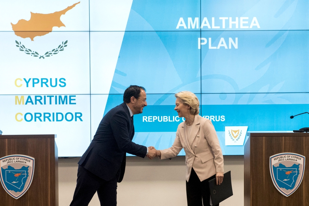 European Commission President Ursula Von der Leyen (right) and Cyprus' President Nikos Christodoulides shake hands during a press conference at JRCC (Joint search and rescue coordination centre) in Larnaca, Cyprus March 8, 2024. — AFP pic 