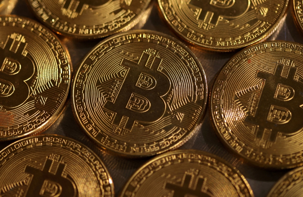 Bitcoin rallied to a record high today in volatile trade, as crypto mania continued to sweep through the investment community. — Reuters pic  