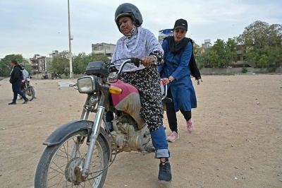 Pakistan’s women ‘Rowdy Riders’ take on traffic and tradition