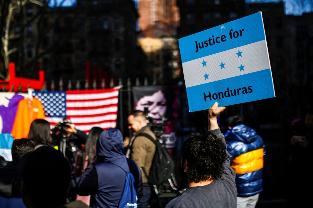 People react to the verdict of Former Honduras President Juan Orlando Hernandez trial on US drug trafficking charges outside federal court in the Manhattan borough of New York March 8, 2024. ― Reuters pic