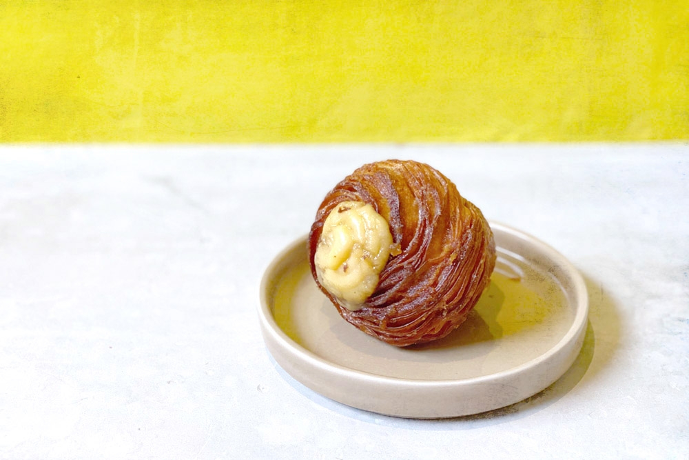 Café Superfluous’ soy 'gula Melaka' cruffin (“croissant + muffin”).