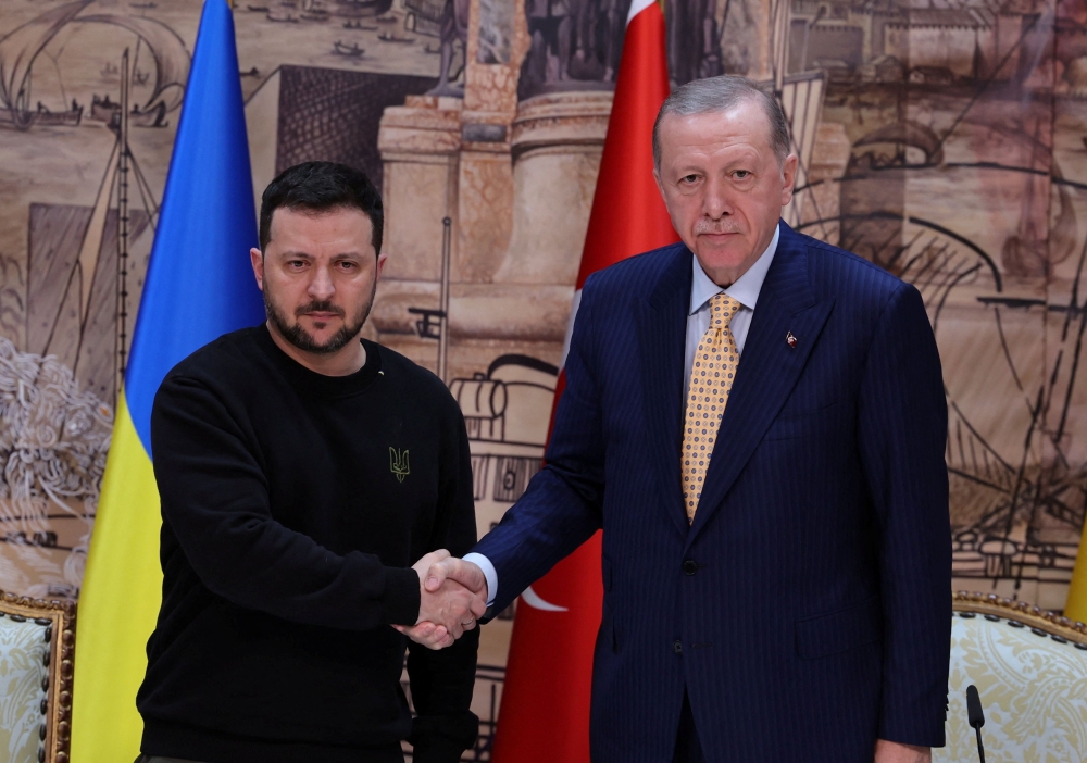 Ukrainian President Volodymyr Zelensky shakes hands with his Turkish counterpart Tayyip Erdogan during a press conference in Istanbul, Turkey March 8, 2024. ― Reuters pic
