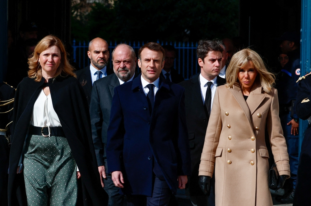 French President Emmanuel Macron (centre), his wife Brigitte Macron (right), National assembly president Yael Braun-Pivet (left), Justice Minister Eric Dupond-Moretti (3rd left) and Prime Minister Gabriel Attal (2nd right) arrive for a ceremony to seal the right to abortion in the Constitution as part of the 2024 international Women’s Day in Paris on March 8, 2024. — AFP pic