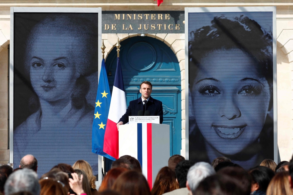 French President Emmanuel Macron delivers a speech during a ceremony to seal the right to abortion in the French constitution, on International Women’s Day, at the Place Vendome, in Paris, on March 8, 2024. — AFP pic