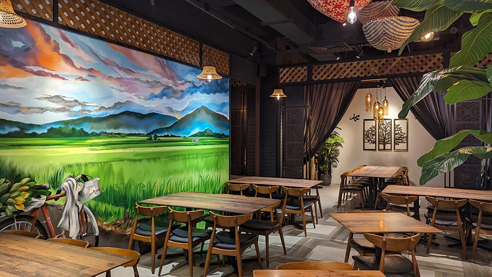 The dining area is carefully curated to match the 'masakan asli kampung' catchline.