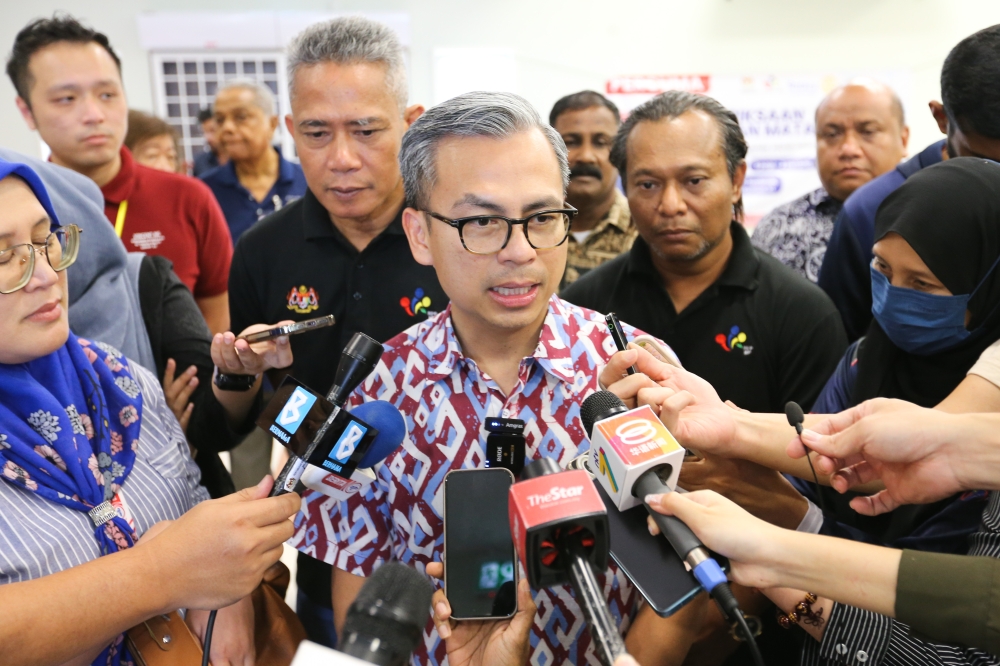 Communications Minister Fahmi Fadzil said among the cooperation given included issues of online security such as scams and online gambling by taking down related content or channels. — Picture by Miera Zulyana