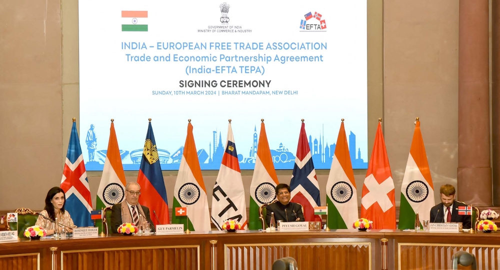 This handout photograph taken and released by the Indian Press Information Bureau (PIB) on March 10, 2024 shows Piyush Goyal (2nd right), India's Minister of Commerce and Industry, Consumer Affairs, Textiles, Food and Public Distribution addressing diplomats at the signing ceremony of Trade and Economic Partnership Agreement (Tepa) between India and European Free Trade Association (Efta) in New Delhi. — AFP / Indian Press Information Bureau (PIB) pic