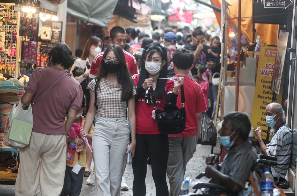 Covid-19 caused the average life expectancy of people worldwide to fall by 1.6 years during the first two years of the pandemic. — Picture by Farhan Najib