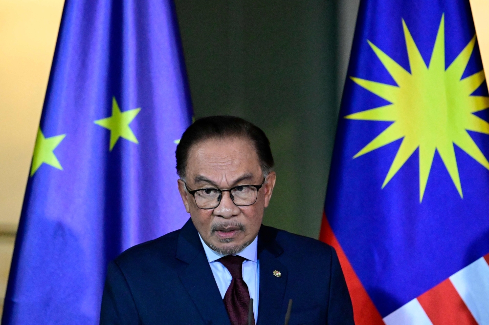 Prime Minister Anwar Ibrahim addresses a joint press conference following talks with the German chancellor at the Chancellery in Berlin on March 11, 2024. — AFP pic 