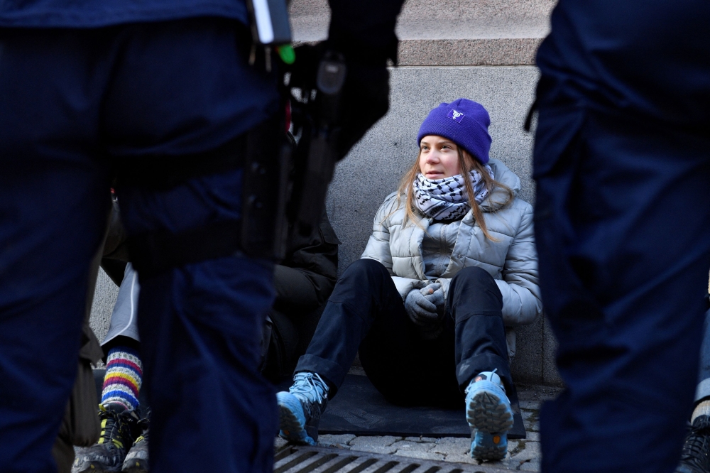 Climate activist Greta Thunberg during a climate action outside the Swedish parliament Riksdag, in Stockholm, Sweden, March 12, 2024. — TT News Agency via Reuters pic