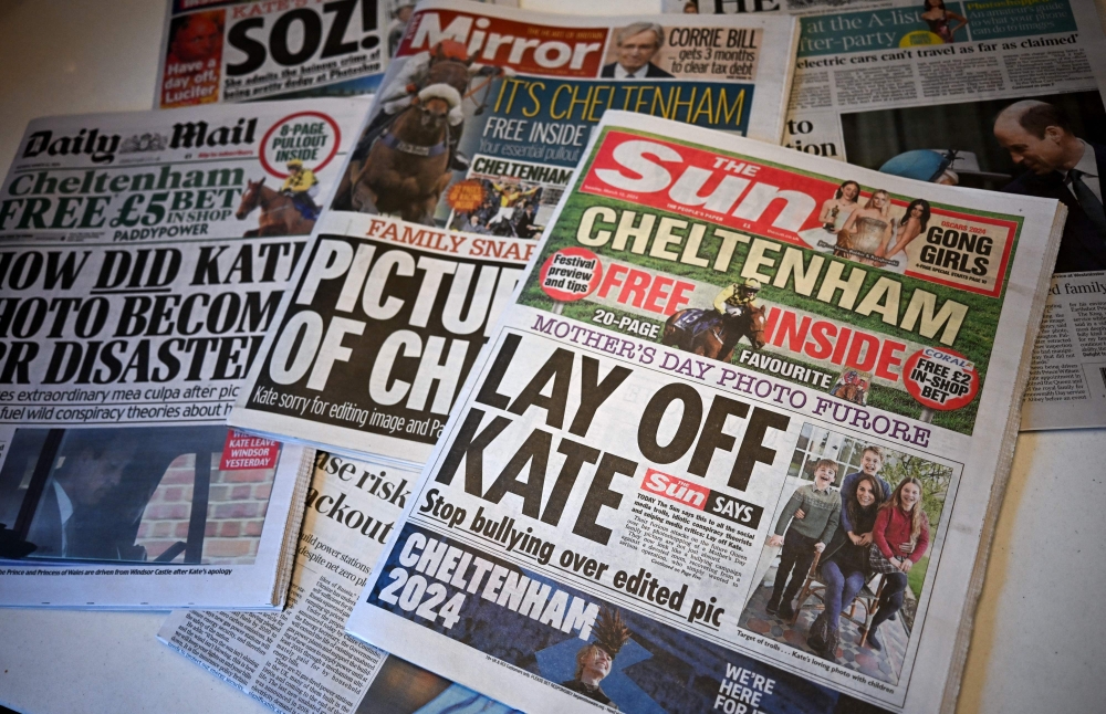 A picture shows the front pages of some of Britain's national newspapers, dominated by stories about the altered mother's day photo released by Kensington Palace on March 10, of Britain's Catherine, Princess of Wales and her children, in London on March 12, 2024. — AFP pic 