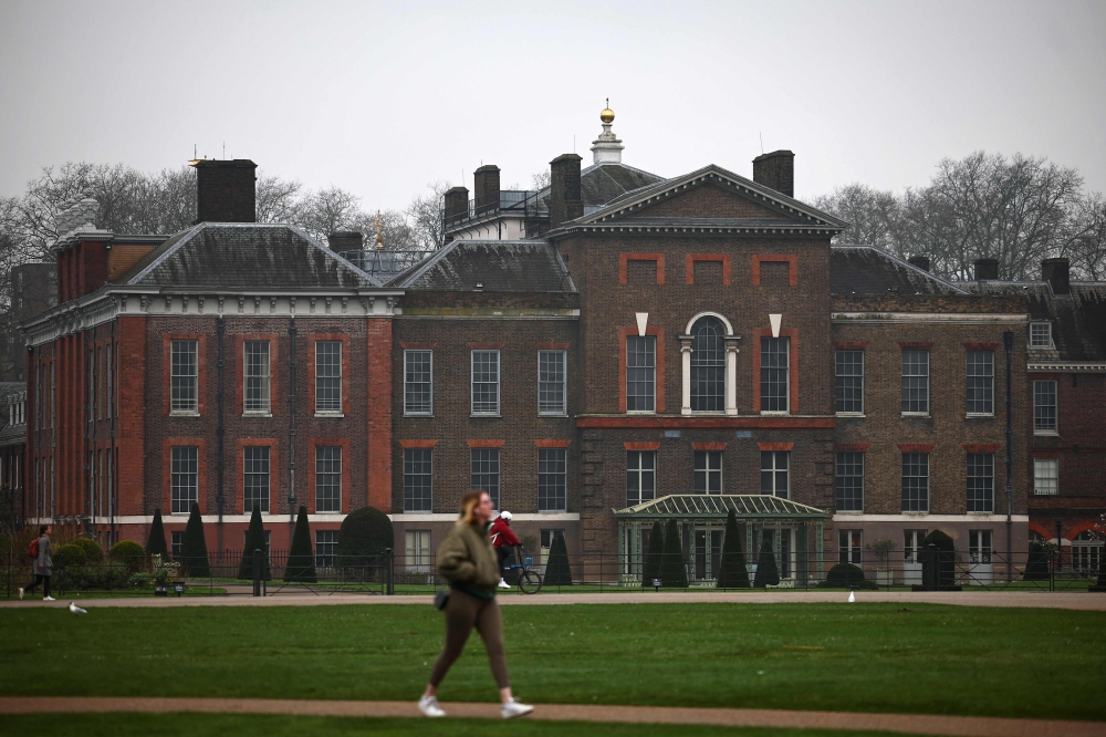 A pedestrian walks near Kensington Palace in London on March 11, 2024. — AFP pic 