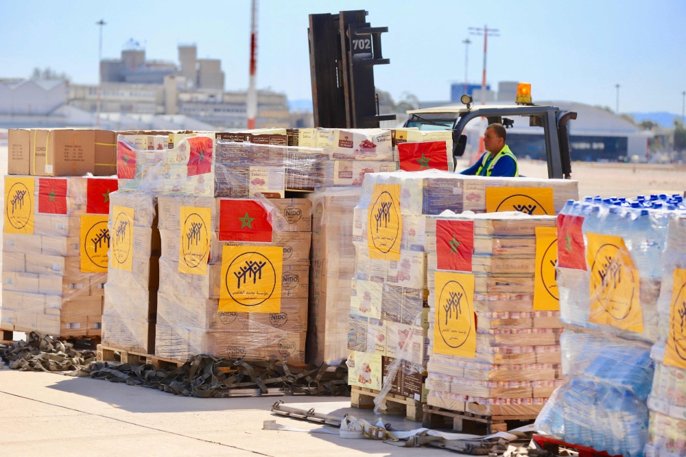 This handout picture taken on March 11, 2024 by the Maghreb Arabe Presse shows  humanitarian aid shipped from Morocco to the people in Gaza being handled at the Israeli Ben Guiron Airport in Tel Aviv. — AFP / Moroccan Press Agency pic
