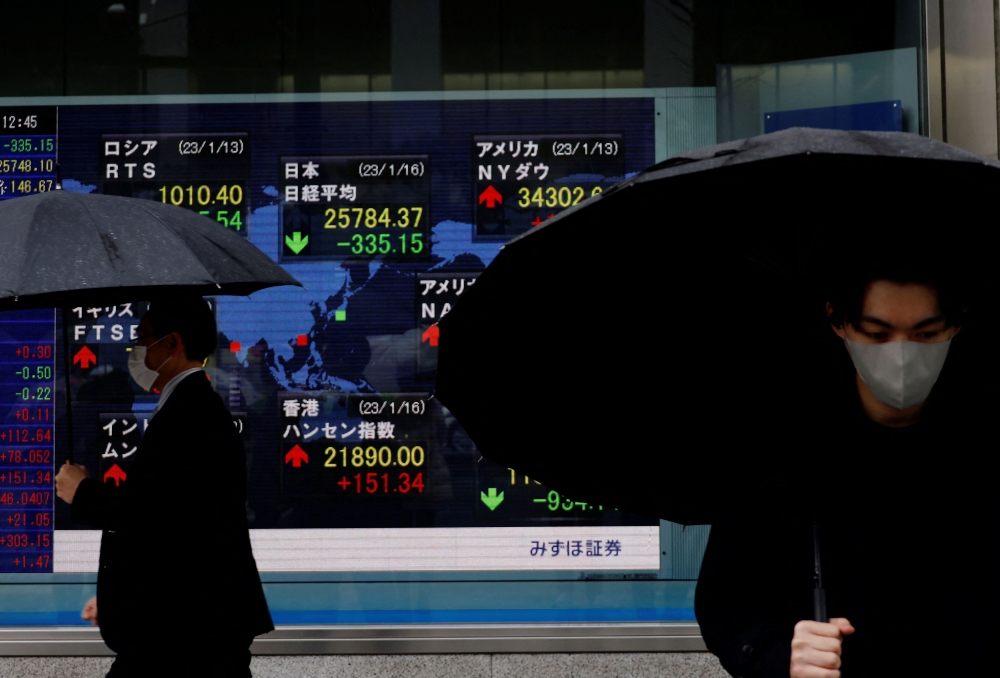 Global stocks, US yields climb after inflation data | Malay Mail